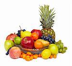 Still life - pineapple, apples and other fruits on white background