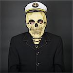 The man - a skeleton in a naval cap on a dark background