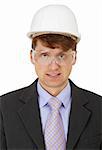 An engineer in a protective helmet and goggles on a white background