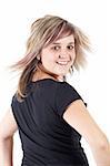 Cute and active young adult caucasian woman wearing a black top with short brunette hair on a white background. Not Isolated