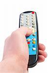Hand holding television remote. Isolated over white background .