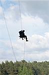 Special forces soldier using rope