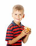 Boy holding an apple  isolated on white background