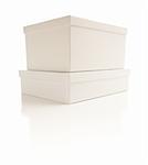 Two Stacked White Boxes with Lids Isolated on a White Background.