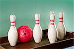 Bowling still life red ball games over green background