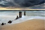 groyne with heavy clouds