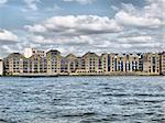 Docks in London Docklands on River Thames, UK - high dynamic range HDR