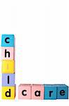 assorted childrens toy letter building blocks against a white background that spell childcare with clipping path