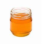 Jar of honey isolated on white background