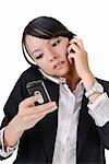 Busy business woman using cellphone and reading SMS, closeup portrait on white background.