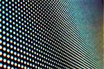 A surface of an LED screen with defocused SMD led bulbs.