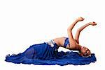 Beautiful Israeli Egyptian Lebanese Middle Eastern belly dancer performer in blue skirt and bra with arms in air laying bending backwards, isolated.