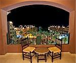 View from the balcony of a luxury hotel in a tropical resort at night