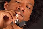 African american male about to light a spliff