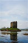 small medieval castle stalker on small island in loch linnhe argyll in the scottish highlands