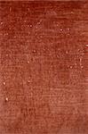 Vintage close up of a brown fabric background