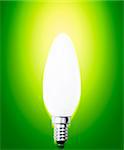 Light bulb isolated on green.