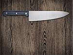 Kitchen knife on wooden table, copy space, clipping path.