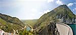 mountain canyon and hydroelectric dam panorama under sky
