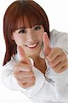 Happy business woman give double excellent gesture with smiling expression.