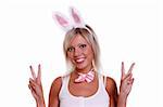Woman wearing fancy dress on Halloween. A young female dressed up as rabbit Cute girl in sexy playboy costume on white backgrounds.