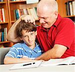 Father takes a break from helping his son with homework to give him noogies.