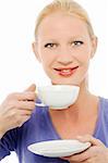 portrait of a young caucasian woman drinking a cup of tea or coffee