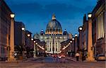 The magnificent evening view of St. Peter's Basilica in Rome by the Via della Conciliazione