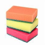 Three colored kitchen sponges isolated on white background