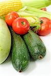 Groop of fresh vegetables closeup on white background