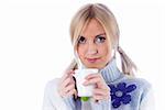 Young beautiful woman with a white cup on isolated background