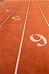 Lanes of a red race track with numbers