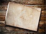 Old paper on panel wood background Horizontal