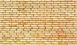 Yellow red brick  wall background. Many old bricks .