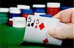 Pair of fives opening hand at Poker (From a series of opening hands at poker)