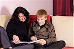 The teenager with parents reading