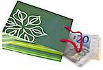 Currency in a Holiday Gift Bag Holiday Spending Concept Isolated on White with a Clipping Path.