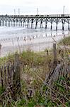 The fishing pier at Surf City, NC on Topsail Island just before dusk.