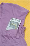 Euro Currency in a Shirt Pocket Money Concept.