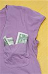 Dollar Bills in a Shirt Pocket Money Concept.