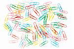 Color paper clips of a paper isolated on white close up