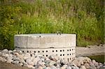 Part of a pond based stormwater management system to prevent flooding in a suburban area.