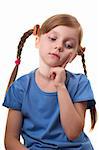 Thinking funny smiling little girl portrait isolated over white background