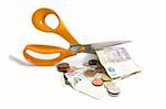 Money and scissors on a white background