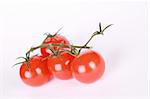 Red cherry tomatoes on a white background.