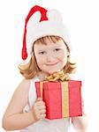 Baby girl in Santa's hat holding her Christmas present isolated on white