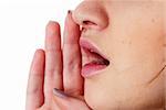 Woman whispering message on white isolated background