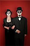 A classy couple with freaky make up for Halloween or All Souls Day