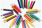 An Arrangement of Color Pencils on White Background