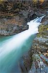 Waterfalls on Rocky Stream, Running Through Autumn Mountain Forest (long time exposure)